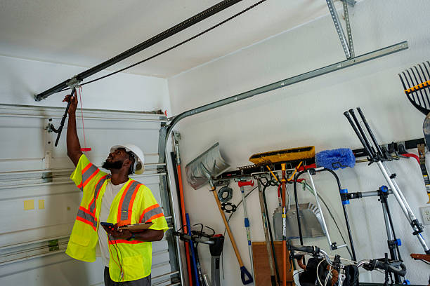 Professional Garage Door Panel Replacement technician working in Neshoba County County, MS